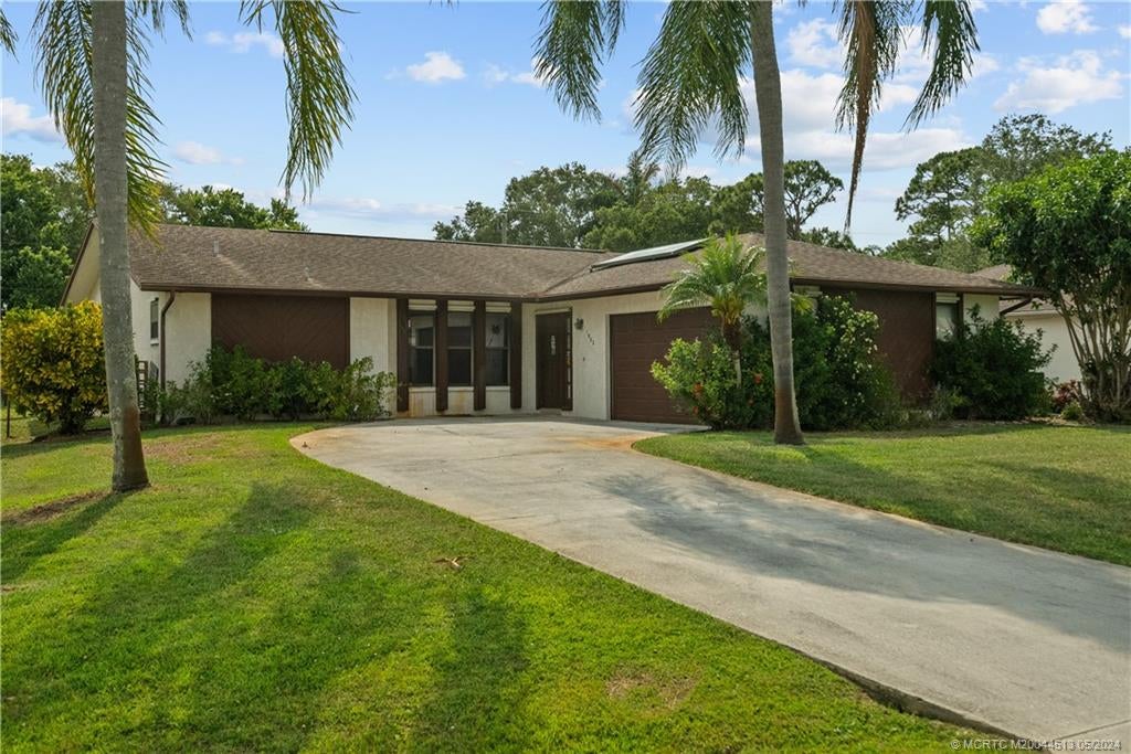 Photo of 1932 SW Sylvester Lane, Port Saint Lucie, FL 34984 (MLS # M20044513)