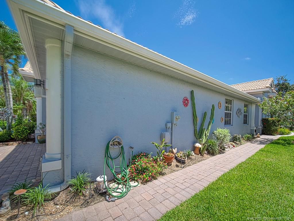 Photo of 561 NW Red Pine Way, Jensen Beach, FL 34957 (MLS # M20045849)