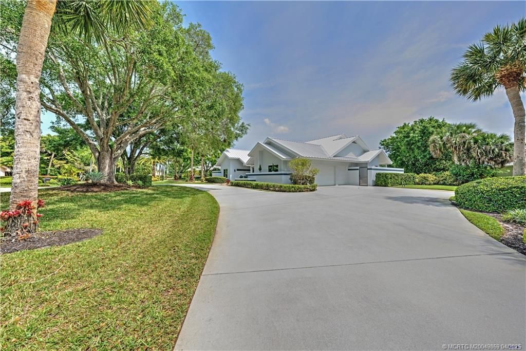 Photo of 5390 SE Burning Tree Circle, Stuart, FL 34997 (MLS # M20049859)