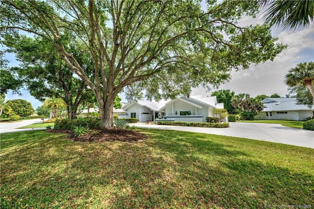 Photo of 5390 SE Burning Tree Circle, Stuart, FL 34997 (MLS # M20049859)