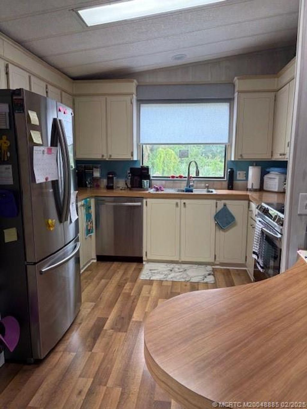 Photo of 6957 SE Sourwood Drive SE, Stuart, FL 34997 (MLS # M20048885)