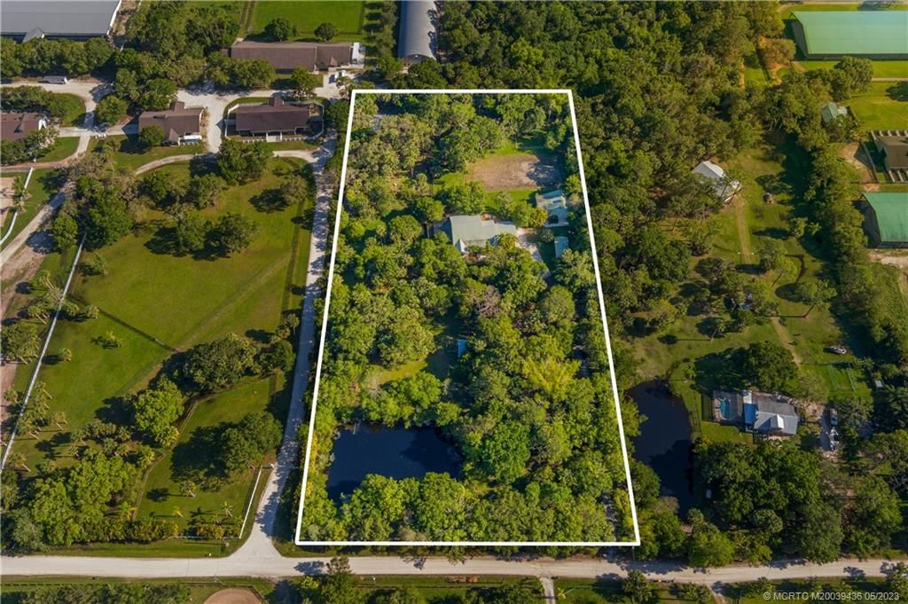 Photo of 5506 SW Ludlum Street, Palm City, FL 34990 (MLS # M20039436)