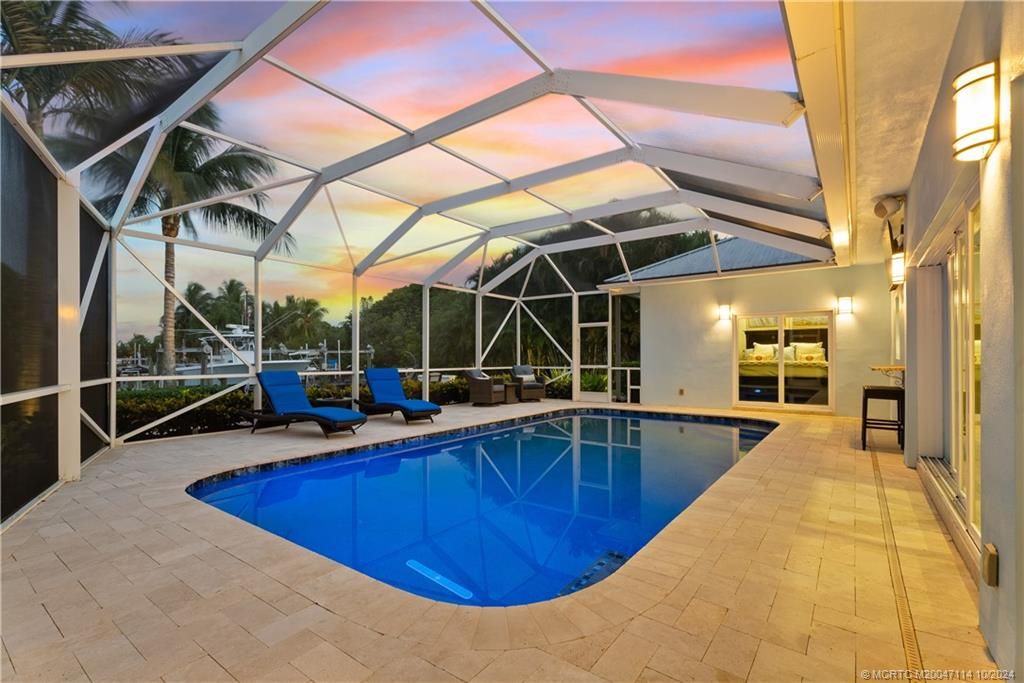 Photo of 67 SW Riverway Boulevard, Palm City, FL 34990 (MLS # M20047114)