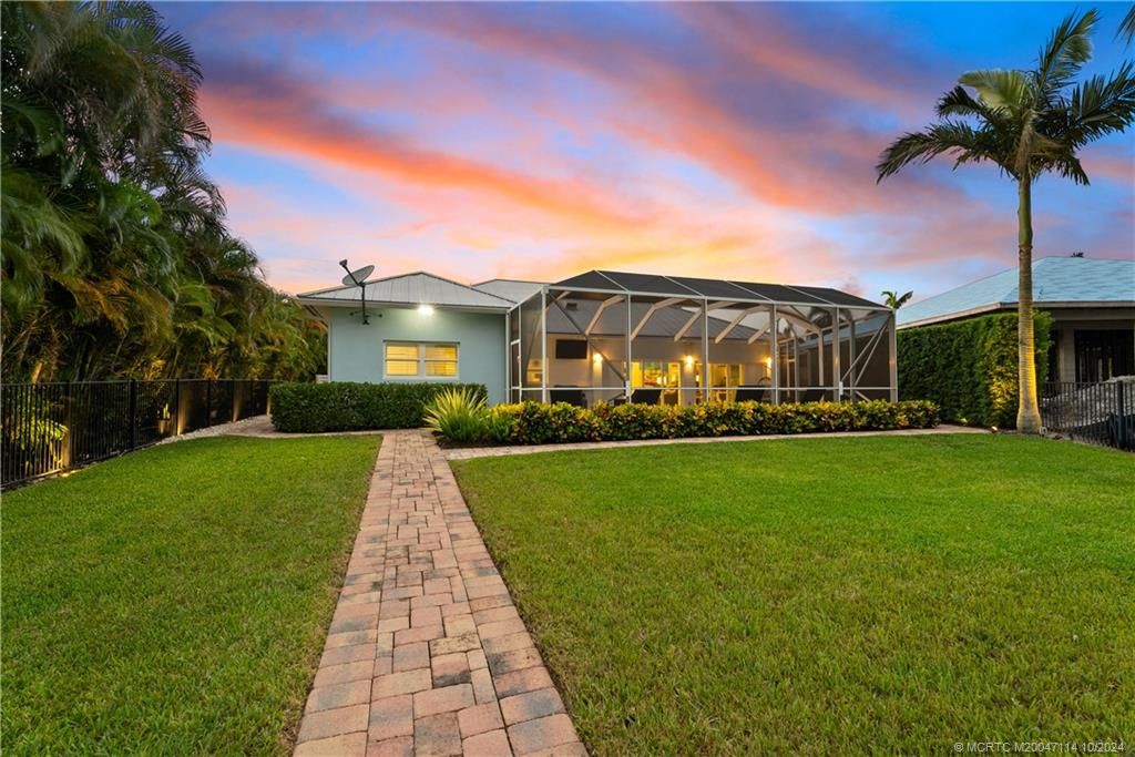 Photo of 67 SW Riverway Boulevard, Palm City, FL 34990 (MLS # M20047114)