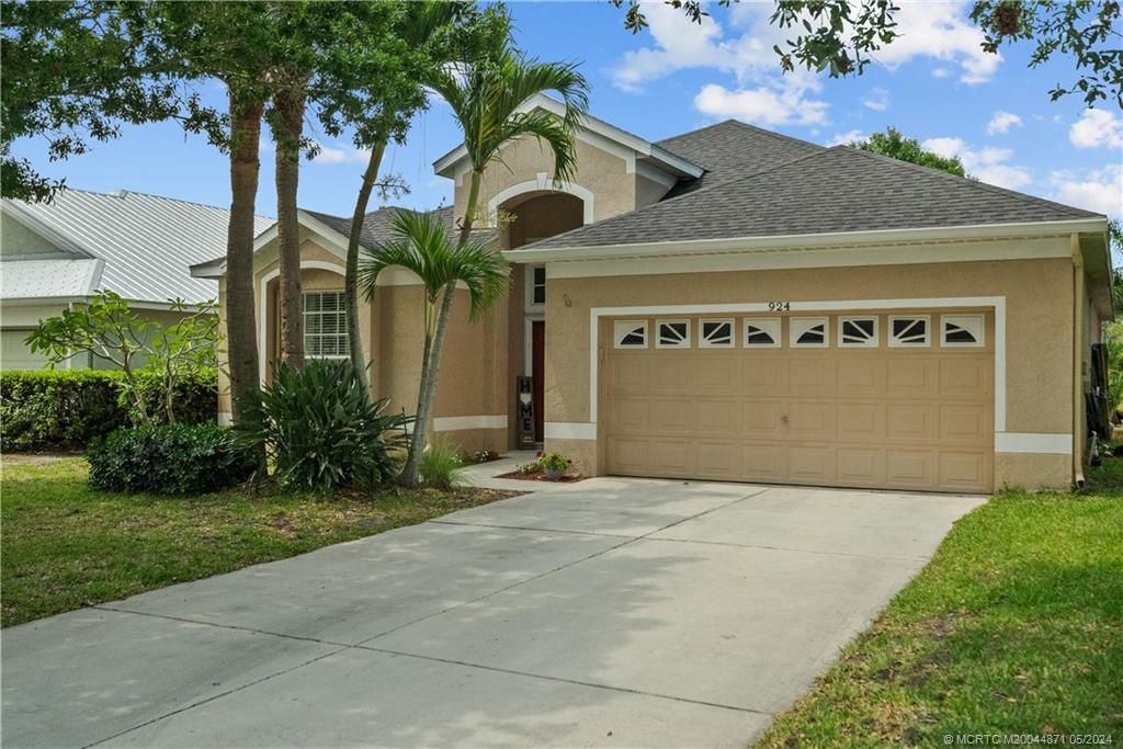 Photo of 924 NW Waterlily Place, Jensen Beach, FL 34957 (MLS # M20044871)