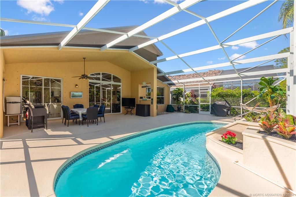 Photo of 2031 NW Marsh Rabbit Lane, Jensen Beach, FL 34957 (MLS # M20047820)