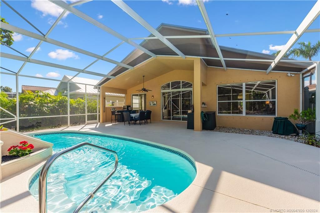 Photo of 2031 NW Marsh Rabbit Lane, Jensen Beach, FL 34957 (MLS # M20047820)