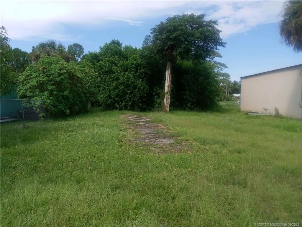 Photo of 5230 SE Ebbtide Avenue, Stuart, FL 34997 (MLS # M20036155)