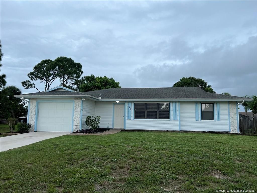Photo of 160 SE Lakehurst Drive, Port Saint Lucie, FL 34983 (MLS # M20048845)