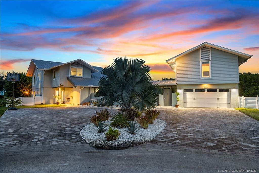 Photo of 1555 SW Pendarvis Court, Palm City, FL 34990 (MLS # M20041141)