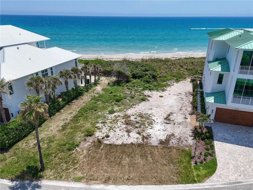 Photo of 8128 S Ocean Drive, Jensen Beach, FL 34957 (MLS # M20050754)