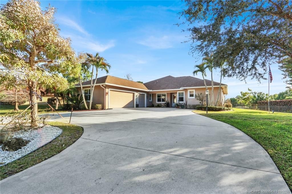 Photo of 757 SE Ashley Oaks Way SE, Stuart, FL 34997 (MLS # M20054263)