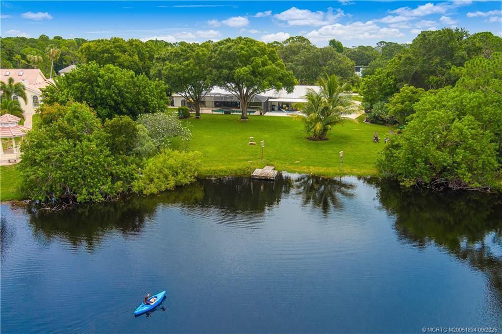 Photo of 2980 NE Pinecrest Lakes Boulevard, Jensen Beach, FL 34957 (MLS # M20051834)