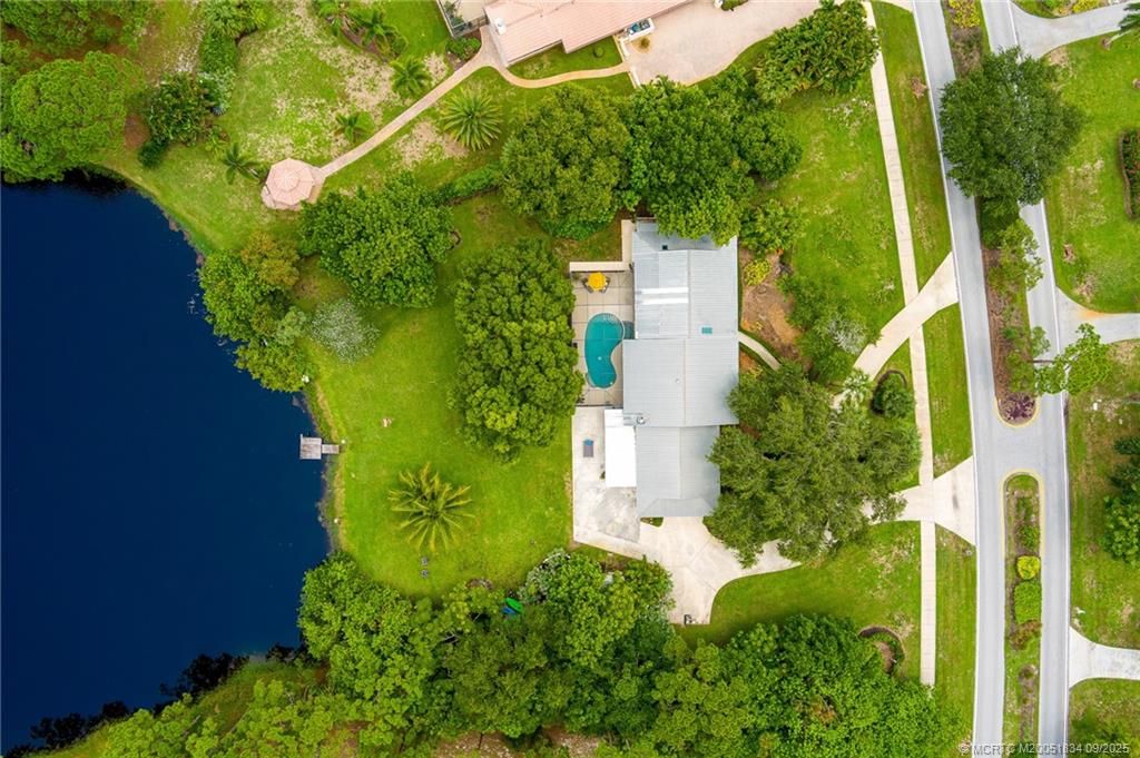 Photo of 2980 NE Pinecrest Lakes Boulevard, Jensen Beach, FL 34957 (MLS # M20051834)