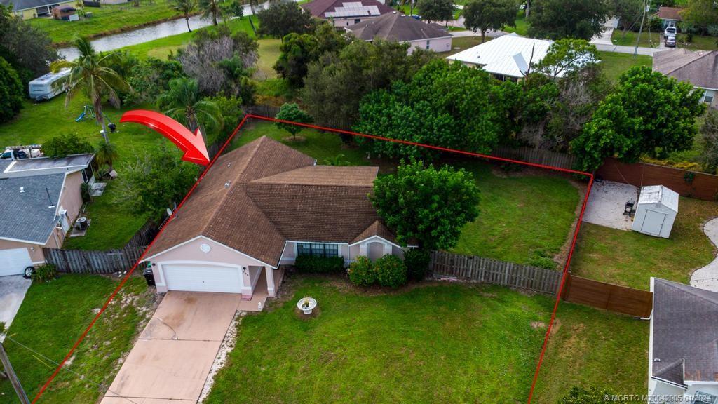 Photo of 708 SW Arkansas Terrace, Port Saint Lucie, FL 34953 (MLS # M20042905)