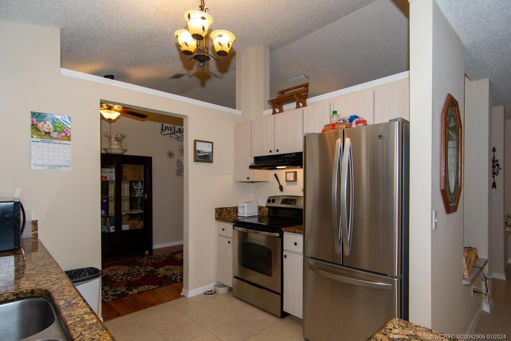 Photo of 708 SW Arkansas Terrace, Port Saint Lucie, FL 34953 (MLS # M20042905)