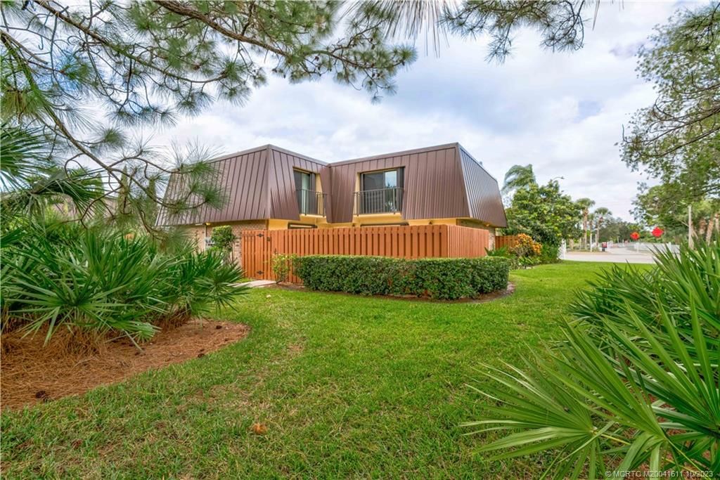 Photo of 5668 SE Windsong Lane, Stuart, FL 34997 (MLS # M20041611)