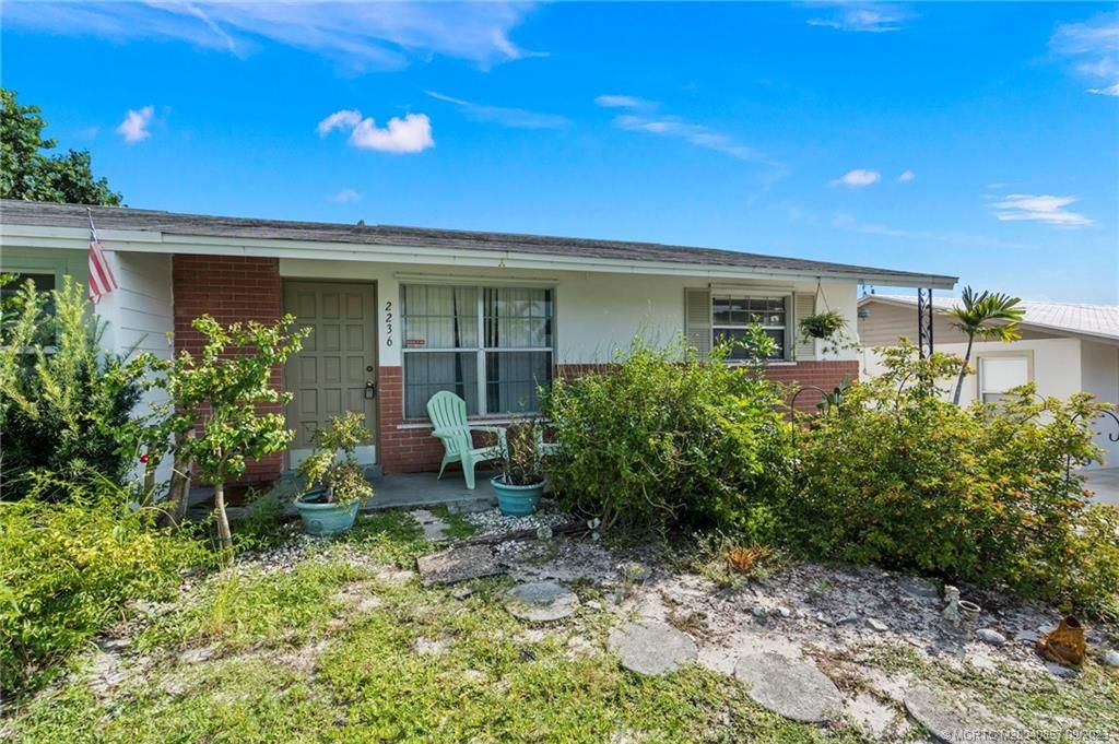 Photo of 2236 NE Rustic Place, Jensen Beach, FL 34957 (MLS # M20040857)