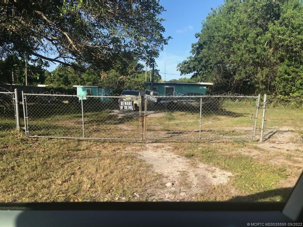 Photo of 5461 SE Ebbtide Avenue, Stuart, FL 34997 (MLS # M20035595)