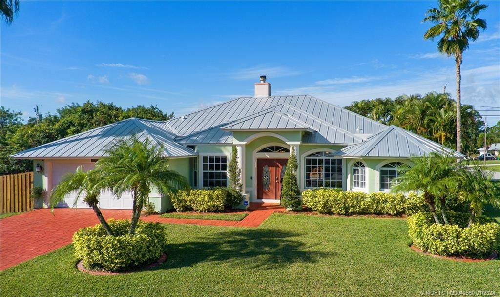Photo of 3902 SW Bamberg Street, Port Saint Lucie, FL 34953 (MLS # M20042550)