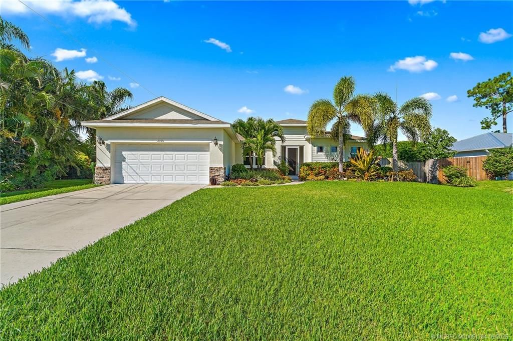 Photo of 2386 SW Madrid Road, Port Saint Lucie, FL 34953 (MLS # M20051784)