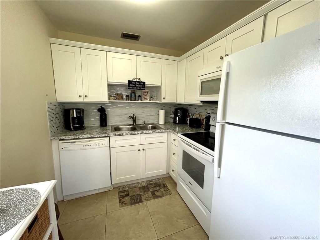 Photo of 2600 SE Ocean Boulevard #Q3, Stuart, FL 34996 (MLS # M20055238)