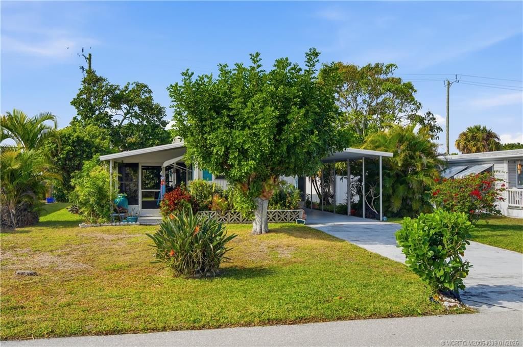 Photo of 7878 SE Swan Avenue, Hobe Sound, FL 33455 (MLS # M20054039)