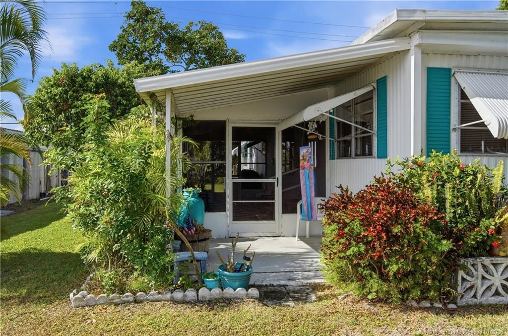 Photo of 7878 SE Swan Avenue, Hobe Sound, FL 33455 (MLS # M20054039)