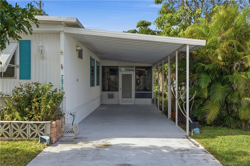 Photo of 7878 SE Swan Avenue, Hobe Sound, FL 33455 (MLS # M20054039)