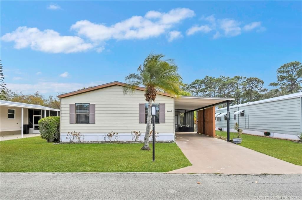 Photo of 8605 Florence Drive, Port Saint Lucie, FL 34952 (MLS # M20054379)