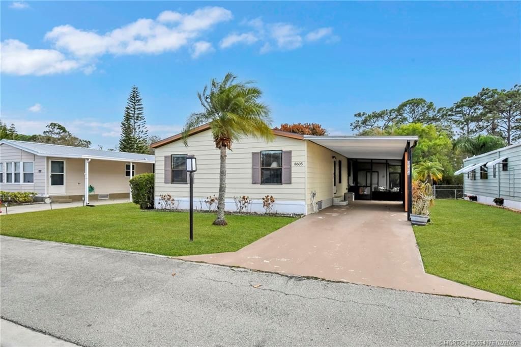 Photo of 8605 Florence Drive, Port Saint Lucie, FL 34952 (MLS # M20054379)