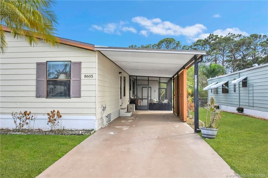 Photo of 8605 Florence Drive, Port Saint Lucie, FL 34952 (MLS # M20054379)