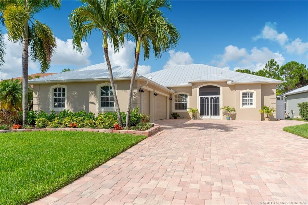 Photo of 472 NW Sunflower Place, Jensen Beach, FL 34957 (MLS # M20045855)