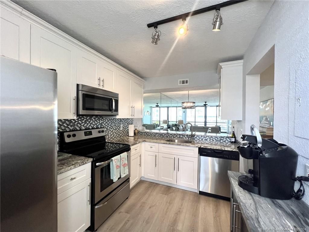 Photo of 1950 SW Palm City Road #12-203, Stuart, FL 34994 (MLS # M20046477)