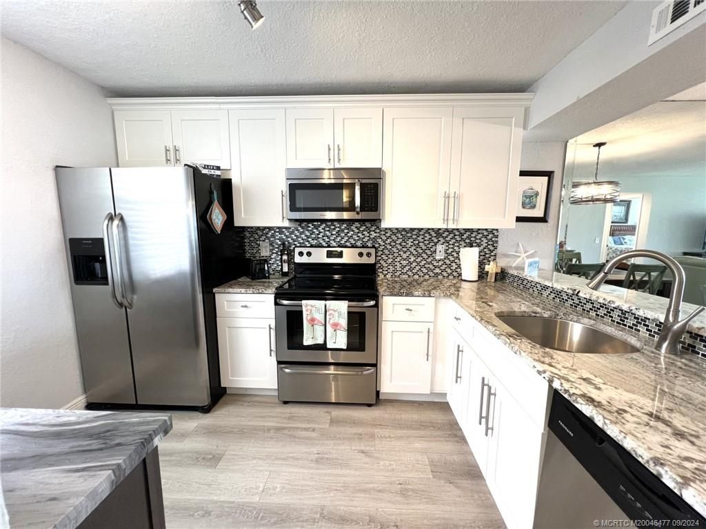 Photo of 1950 SW Palm City Road #12-203, Stuart, FL 34994 (MLS # M20046477)