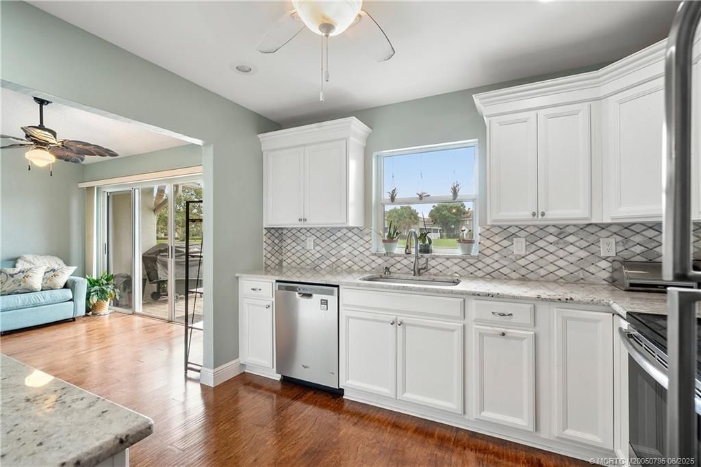 Photo of 3188 SW Sunset Trace Circle, Palm City, FL 34990 (MLS # M20050795)