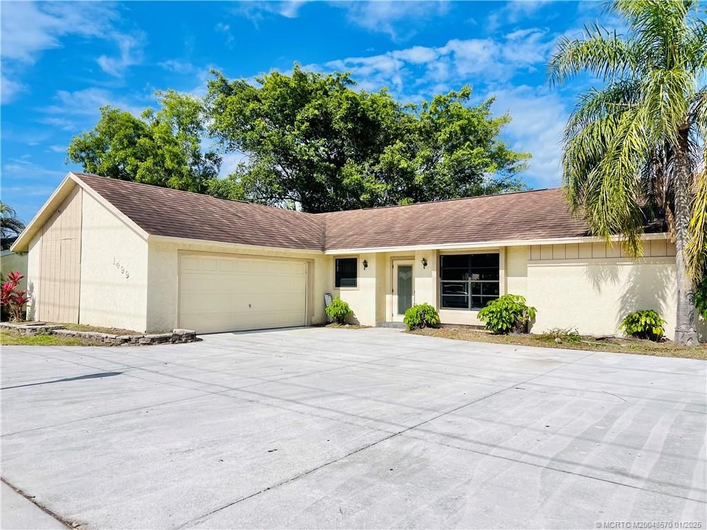 Photo of 1499 SE Port St Lucie Boulevard, Port Saint Lucie, FL 34952 (MLS # M20048570)