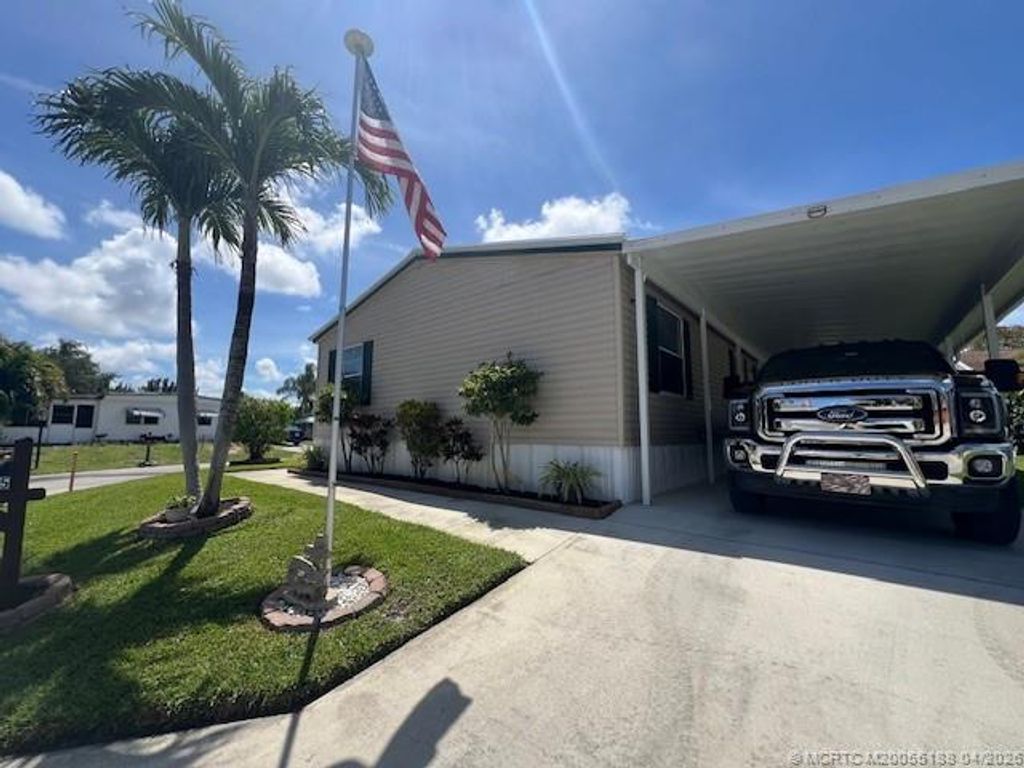 Photo of 6155 N Ironwood Lane, Lantana, FL 33462 (MLS # M20055188)