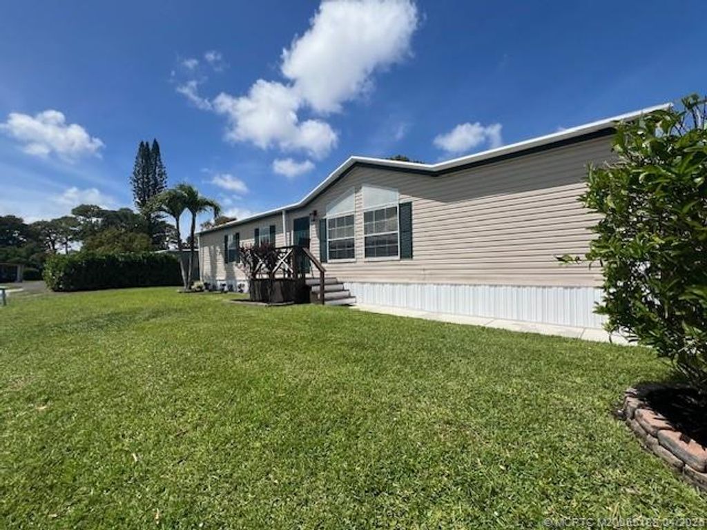 Photo of 6155 N Ironwood Lane, Lantana, FL 33462 (MLS # M20055188)