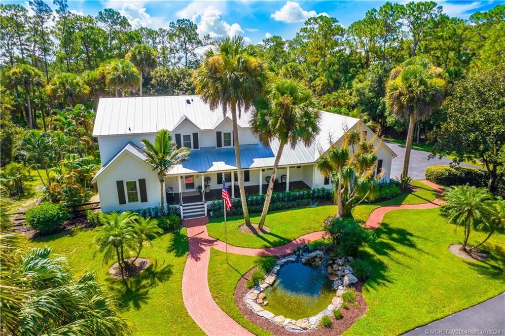 Photo of 4270 SW Country Place, Palm City, FL 34990 (MLS # M20046061)
