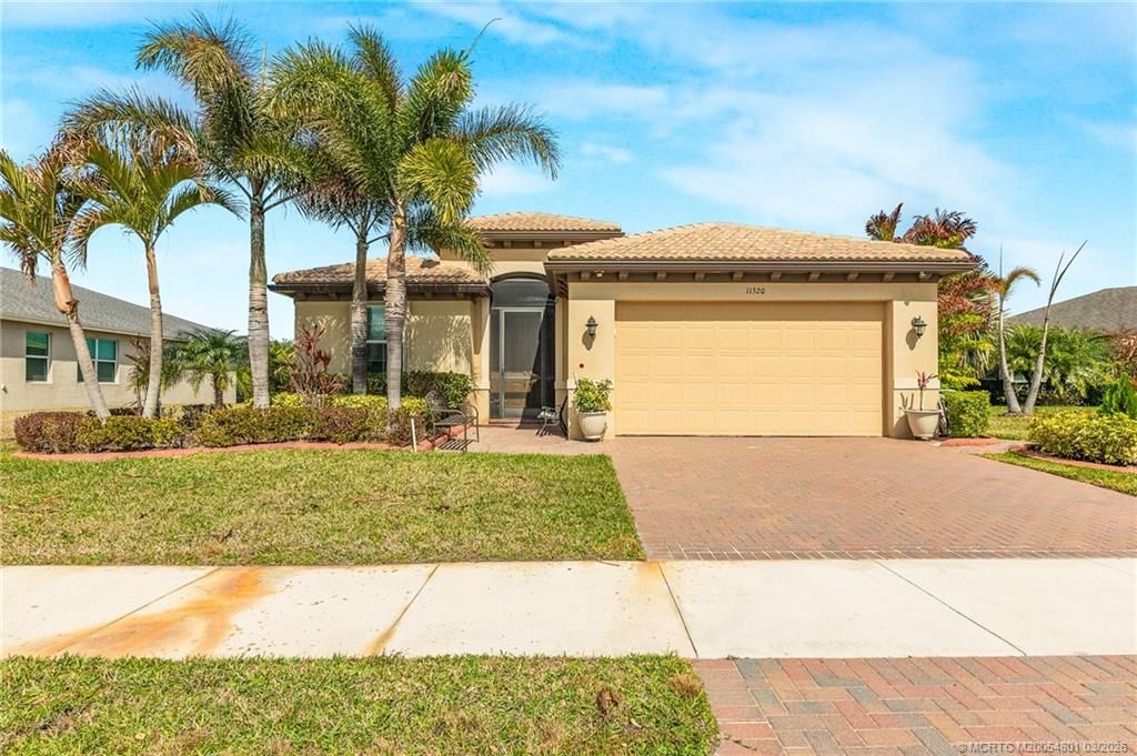 Photo of 11320 SW Lake Park Drive, Port Saint Lucie, FL 34987 (MLS # M20054801)