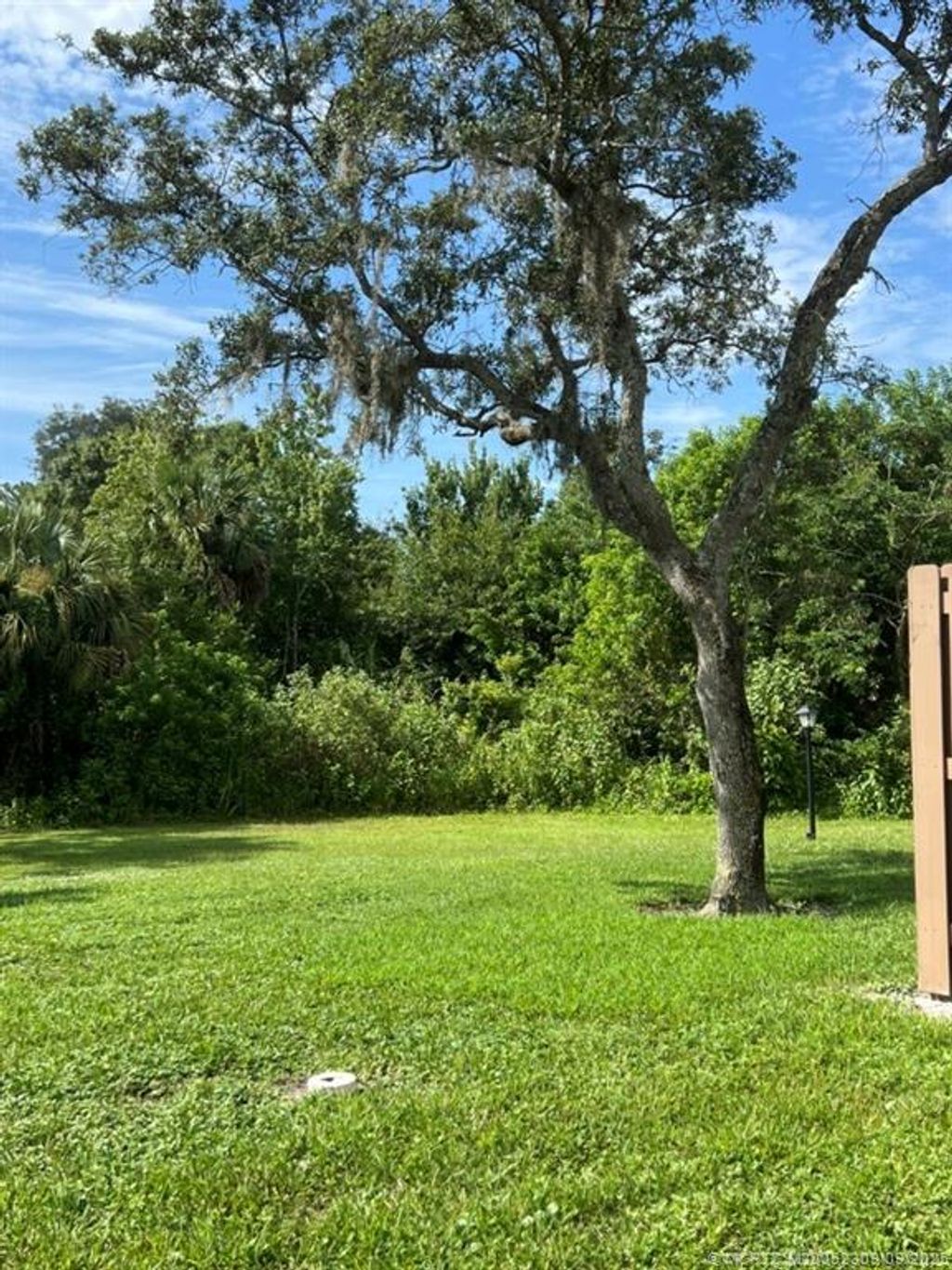 Photo of 1454 SW Silver Pine Way #101A, Palm City, FL 34990 (MLS # M20052309)