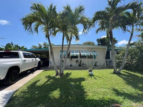 Photo of 6322 Cypress Lane, Lantana, FL 33462 (MLS # M20056223)