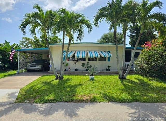 Photo of 6322 Cypress Lane, Lantana, FL 33462 (MLS # M20056223)