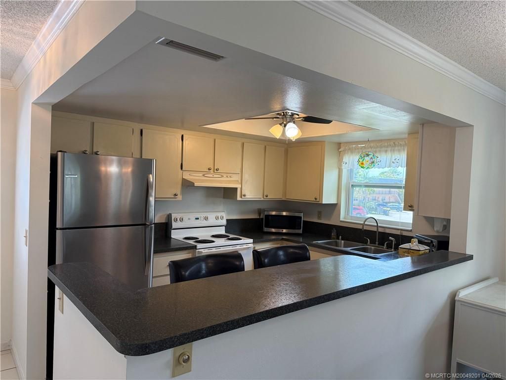 Photo of 2950 SE Ocean Boulevard #4-4, Stuart, FL 34996 (MLS # M20049201)