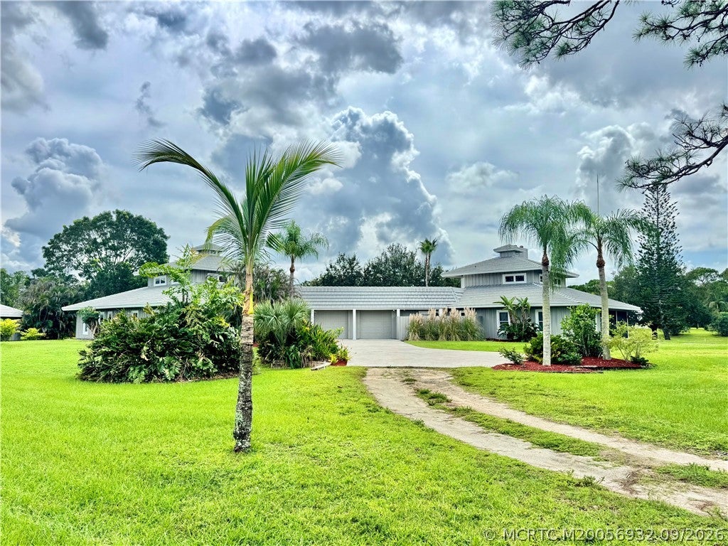 Photo of 9832 SW Santa Monica Drive, Palm City, FL 34990 (MLS # M20056932)