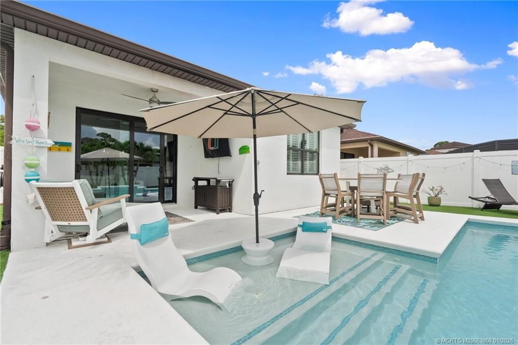 Photo of 260 SE Via Visconti, Port Saint Lucie, FL 34952 (MLS # M20053908)