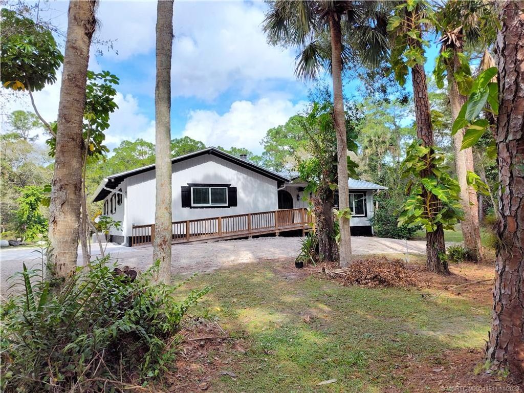 Photo of 6953 SW Wisteria Terrace, Palm City, FL 34990 (MLS # M20041511)