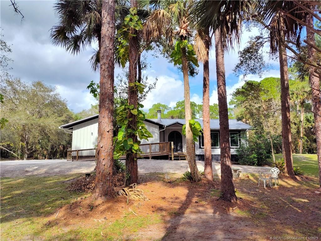 Photo of 6953 SW Wisteria Terrace, Palm City, FL 34990 (MLS # M20041511)