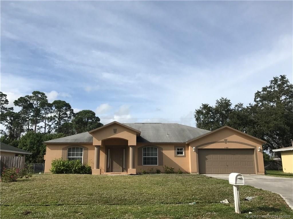 Photo of 1180 SE Ladner Street, Port Saint Lucie, FL 34983 (MLS # M20052254)